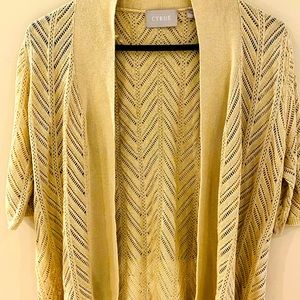 Tan net half sleeves cardigan.
